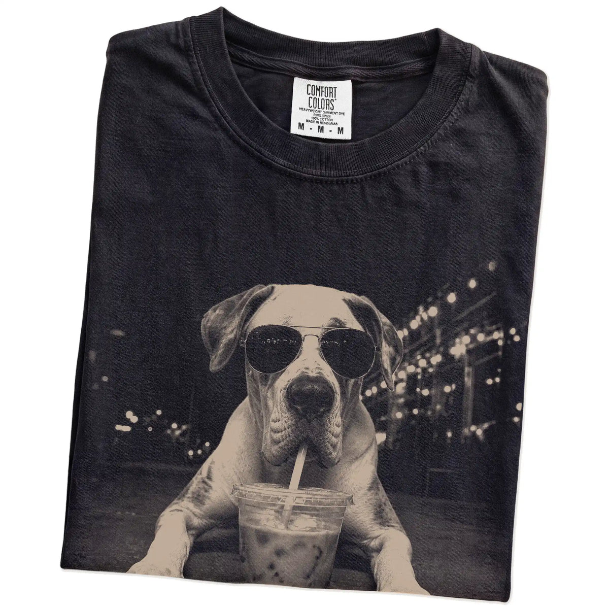 Folded Black Comfort Colors® T-shirt showing Great Dane with iced coffee in a retro grunge design