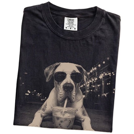 Folded Black Comfort Colors® T-shirt showing Great Dane with iced coffee in a retro grunge design