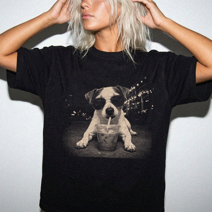 Model wearing a Black Comfort Colors® T-shirt featuring Jack Russell with iced coffee in a retro grunge design