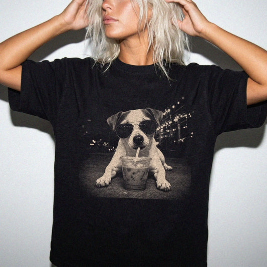 Model wearing a Black Comfort Colors® T-shirt featuring Jack Russell with iced coffee in a retro grunge design