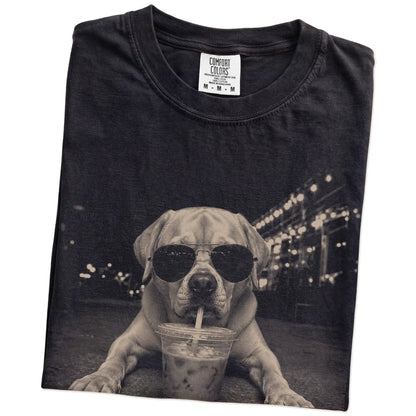 Folded Black Comfort Colors® T-shirt showing Labrador Retriever with iced coffee in a retro grunge design