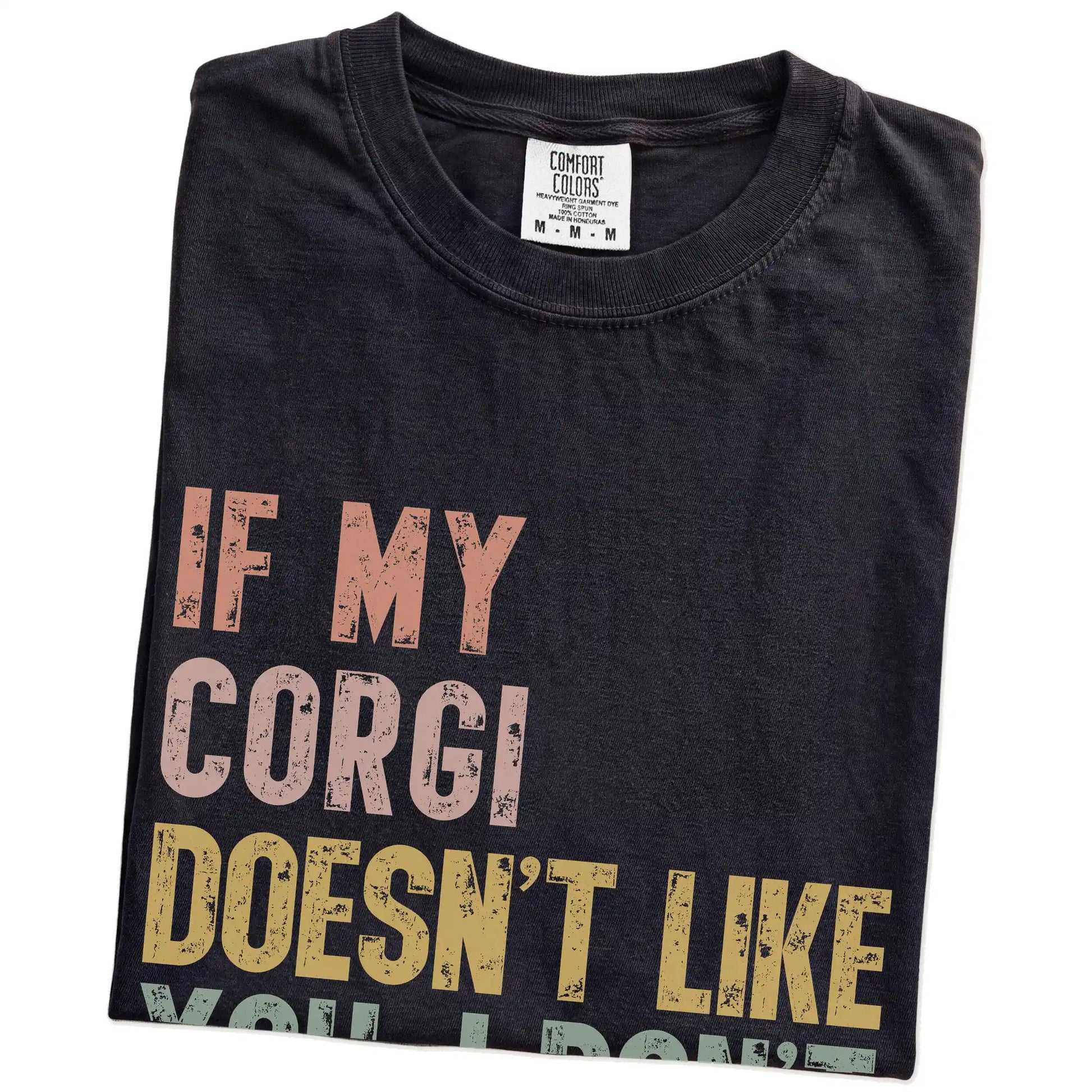 Folded Black Comfort Colors® T-shirt showing Corgi with “If My Dog Doesn’t Like You, I Don’t Either” lettering