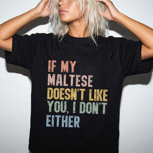 Model wearing a Black Comfort Colors® T-shirt featuring Maltese with “If My Dog Doesn’t Like You, I Don’t Either” lettering