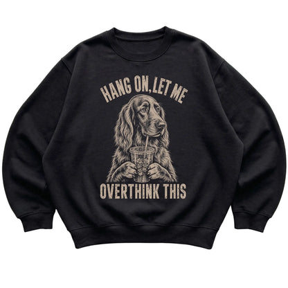 Black crewneck sweatshirt featuring Overthinking Irish Setter, laid-flat presentation