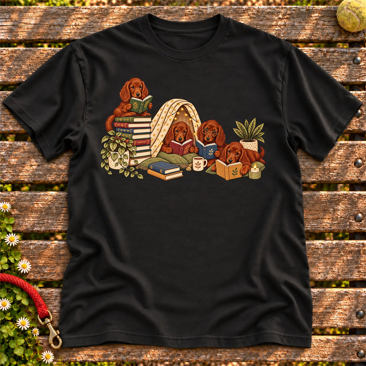 Irish Setter puppies reading books in a cozy blanket fort on a Black T-shirt