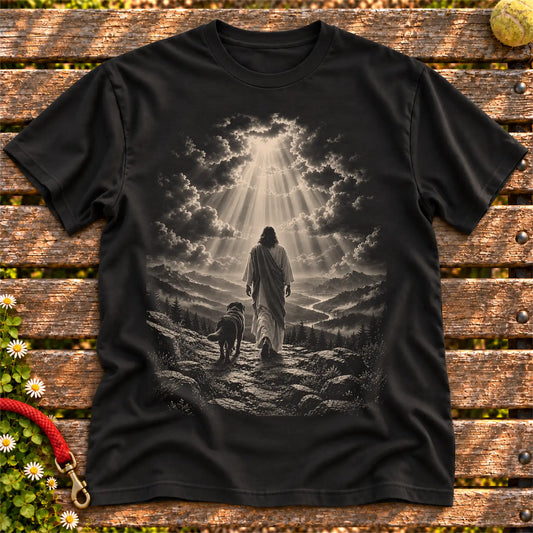 Black T-shirt showing Jesus walking beside a Labrador beneath rays of light