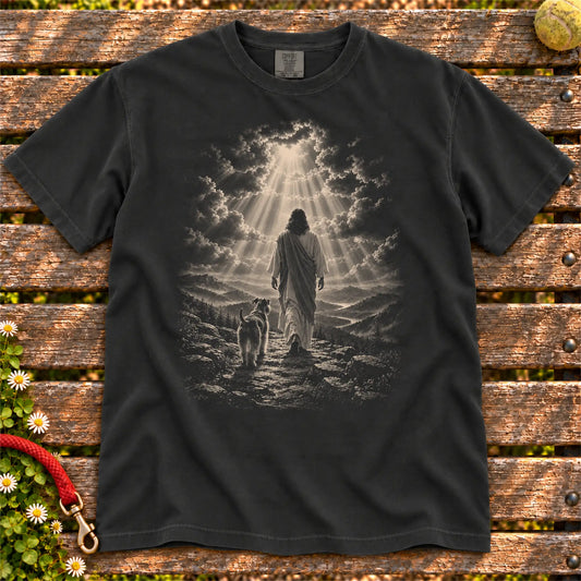 Black T-shirt showing Jesus walking beside a Schnauzer beneath rays of light