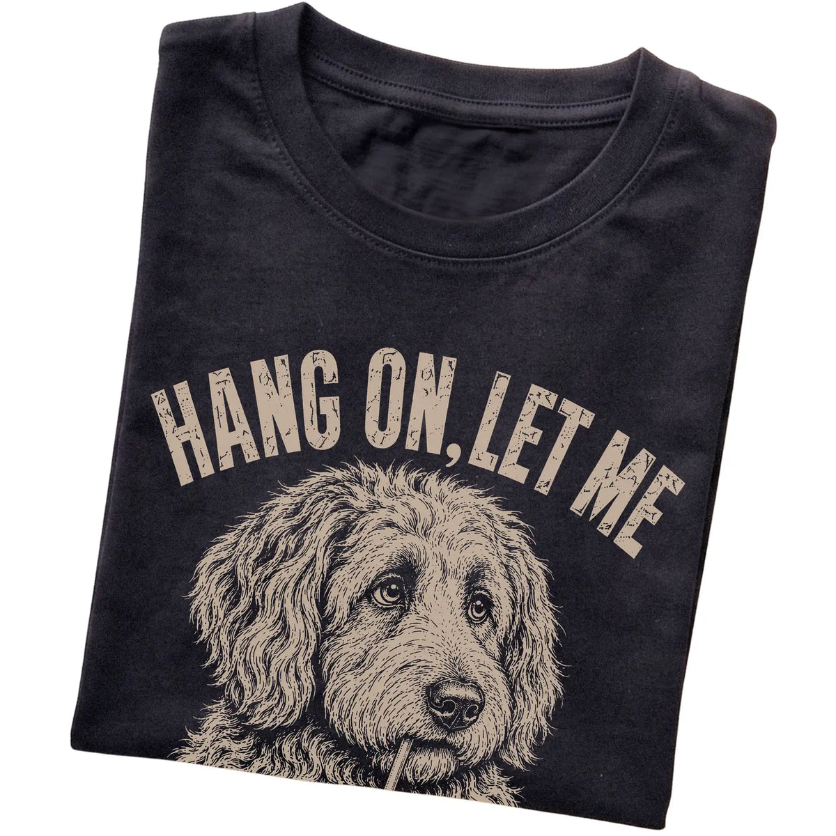 Black T-shirt featuring Overthinking Labradoodle, folded presentation