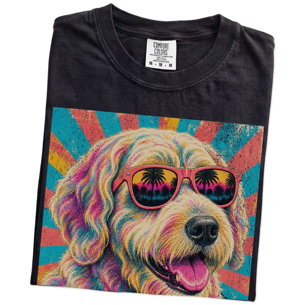 Retro Labradoodle Mama design on a Black Comfort Colors T-shirt folded detail
