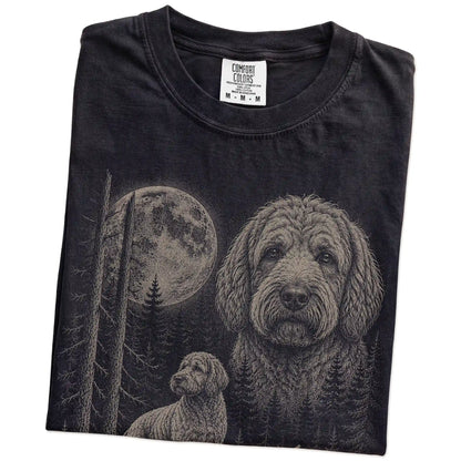 Folded Black Labradoodle Moonlit Forest T-Shirt showing the graphic