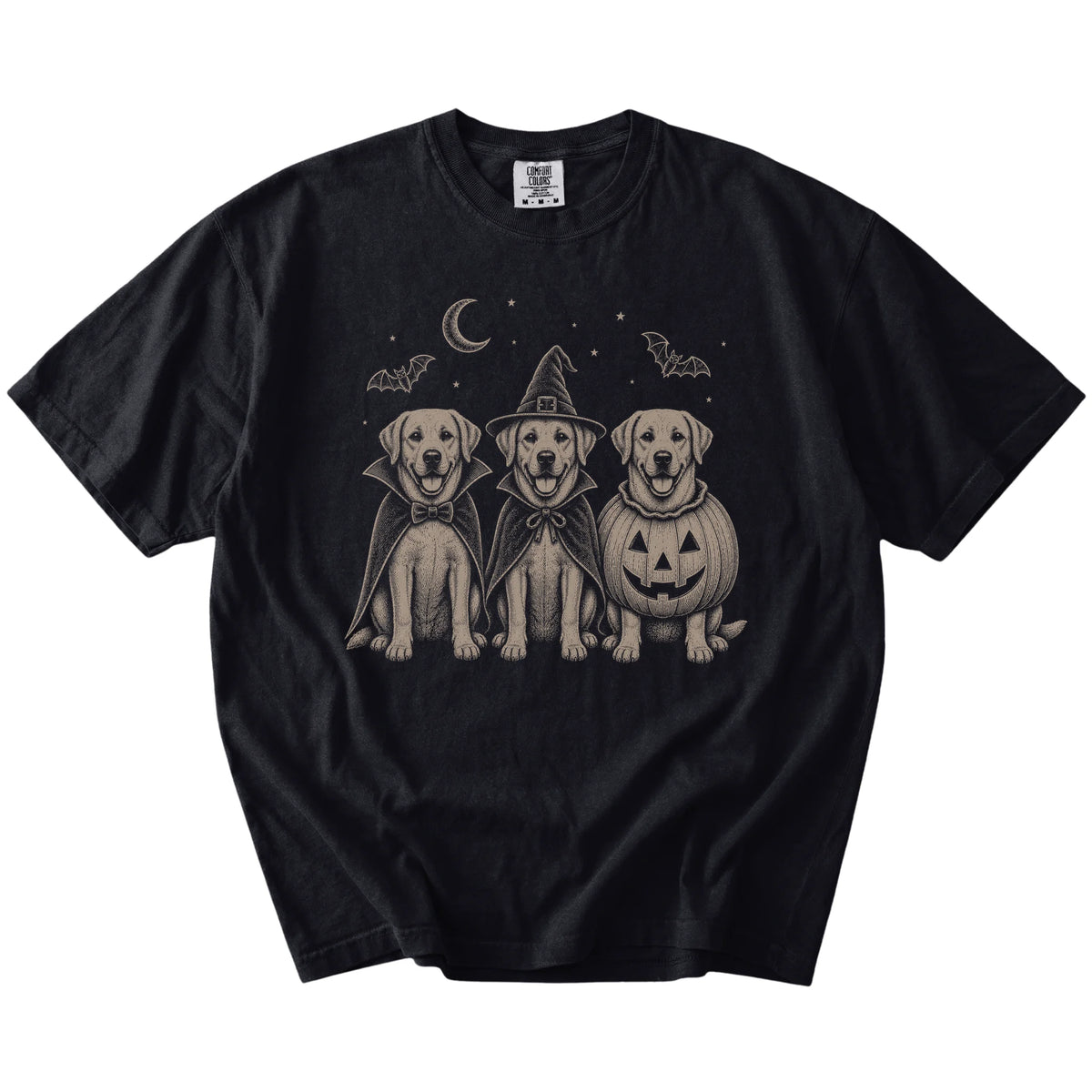 Three Labrador Retriever dogs dressed for Halloween beneath bats and a crescent moon on a Black Comfort Colors® T-shirt