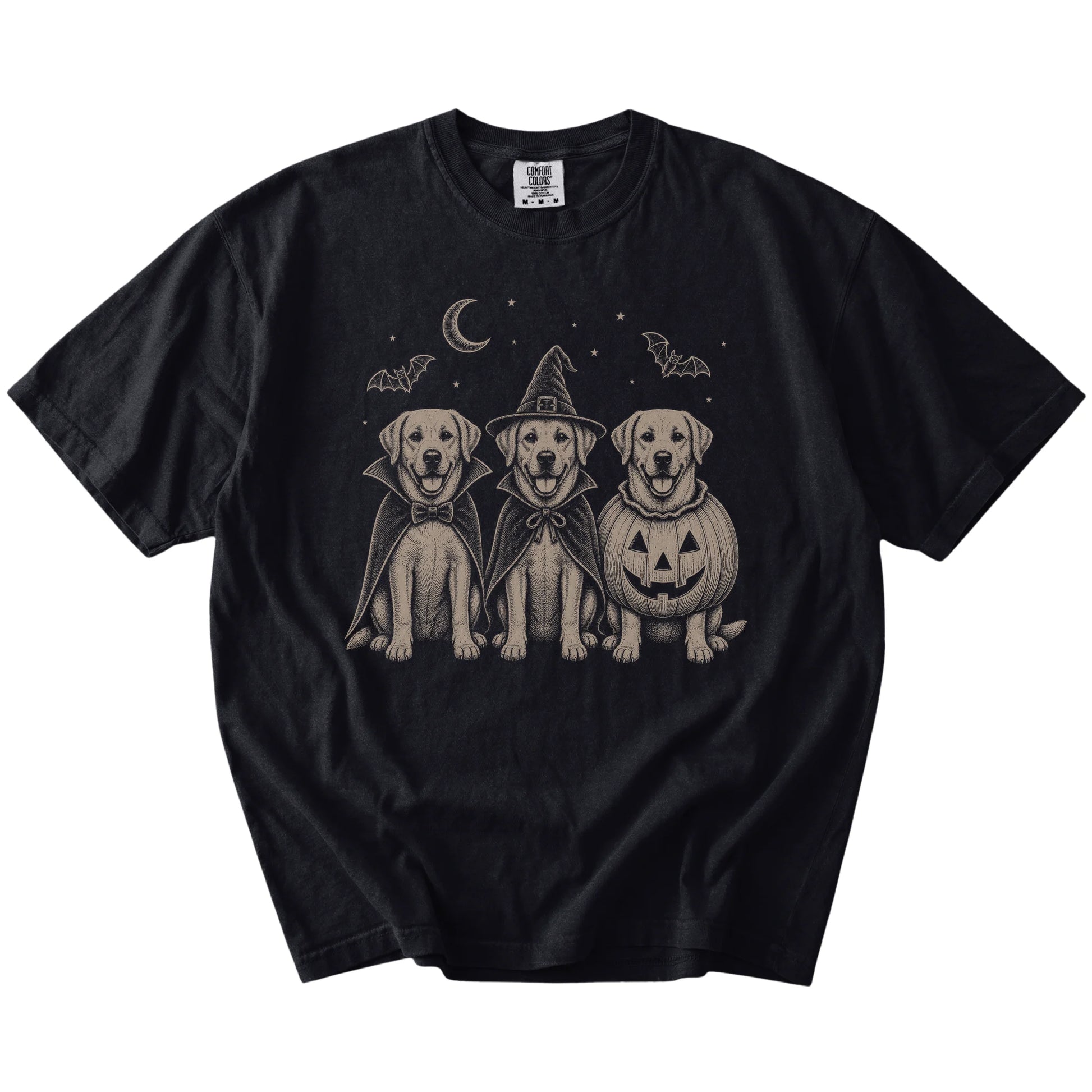 Three Labrador Retriever dogs dressed for Halloween beneath bats and a crescent moon on a Black Comfort Colors® T-shirt