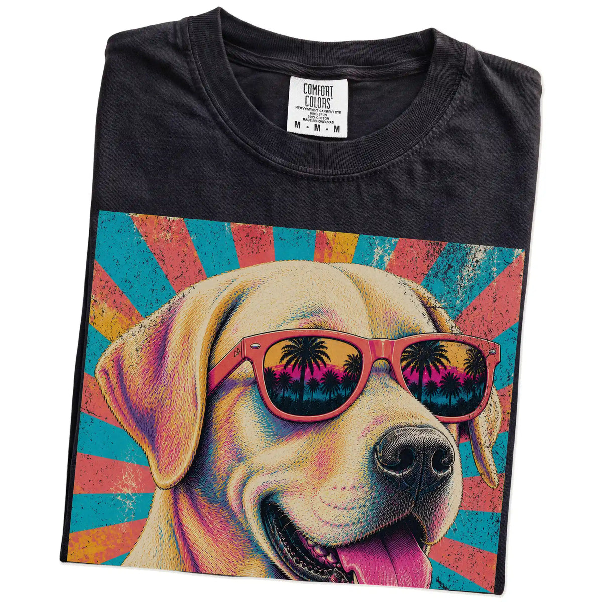 Retro Labrador Retriever Mama design on a Black Comfort Colors T-shirt folded detail