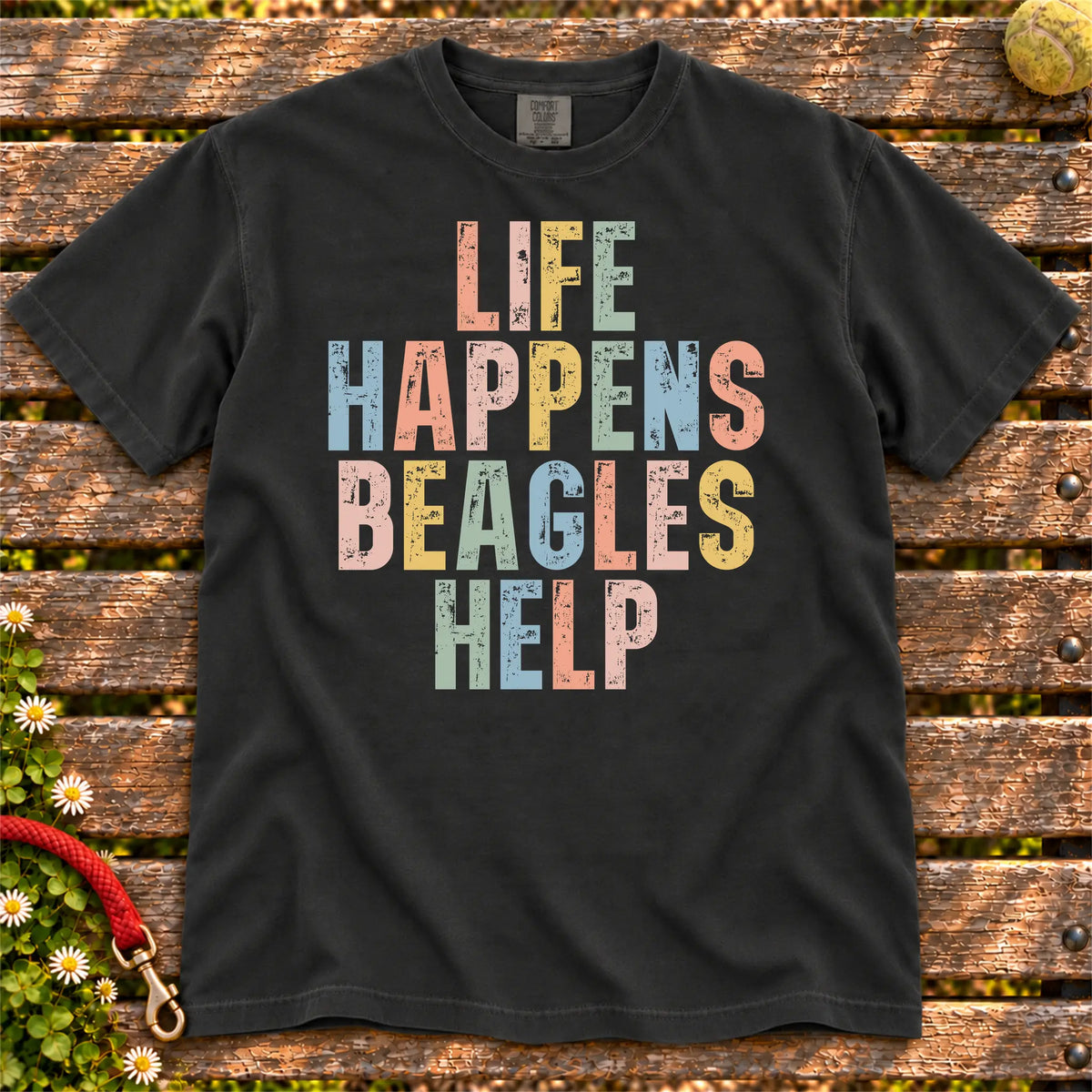 Beagle making hard days better with “Life Happens, Dogs Help” lettering on a Black Comfort Colors® T-shirt