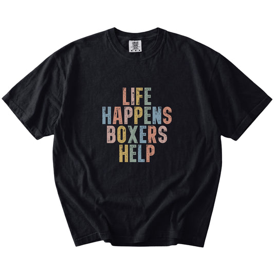 Boxer making hard days better with “Life Happens, Dogs Help” lettering on a Black Comfort Colors® T-shirt
