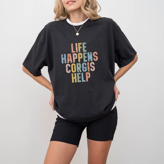 Model wearing a Black Comfort Colors® T-shirt featuring Corgi making hard days better with “Life Happens, Dogs Help” letterin