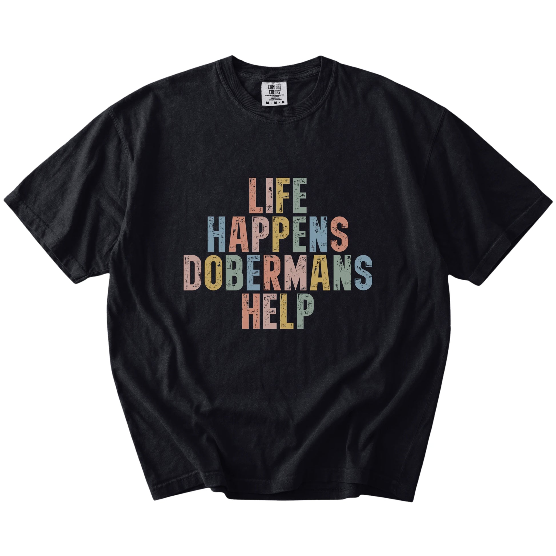 Doberman making hard days better with “Life Happens, Dogs Help” lettering on a Black Comfort Colors® T-shirt