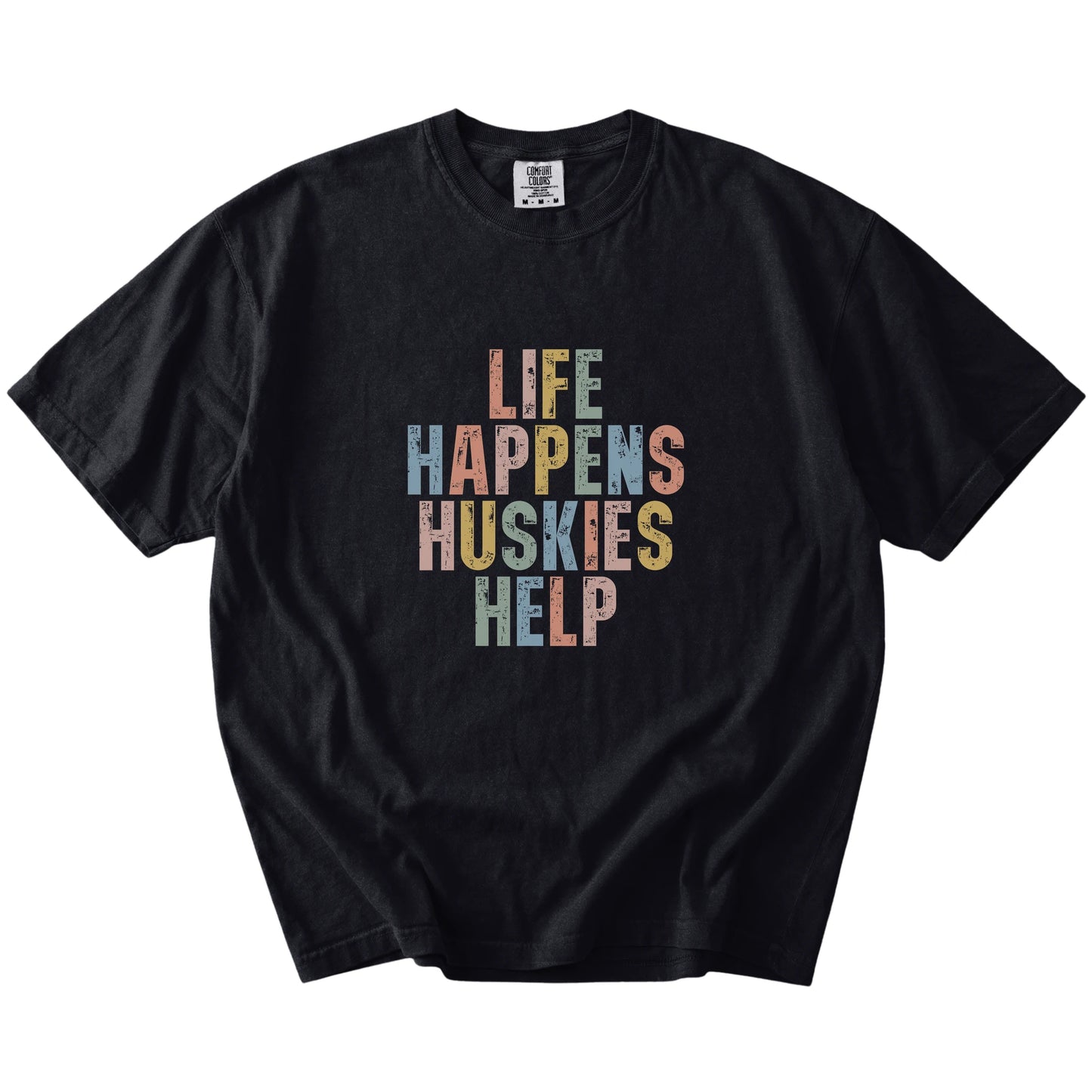 Husky making hard days better with “Life Happens, Dogs Help” lettering on a Black Comfort Colors® T-shirt