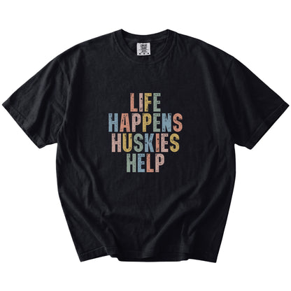 Husky making hard days better with “Life Happens, Dogs Help” lettering on a Black Comfort Colors® T-shirt