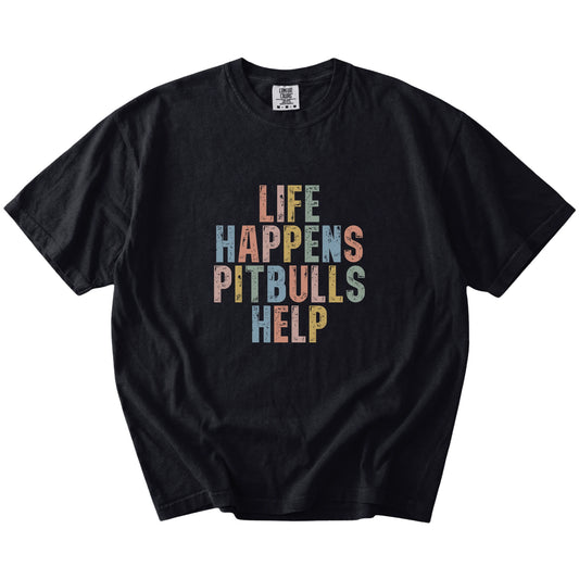Pitbull making hard days better with “Life Happens, Dogs Help” lettering on a Black Comfort Colors® T-shirt