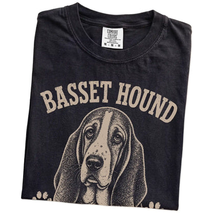 Folded Black Comfort Colors® T-shirt showing Basset Hound design with “Low Energy, High Standards” lettering