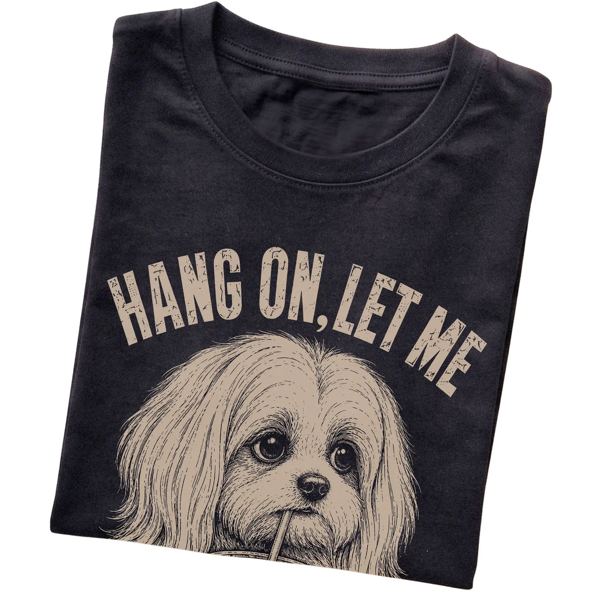 Black T-shirt featuring Overthinking Maltese, folded presentation