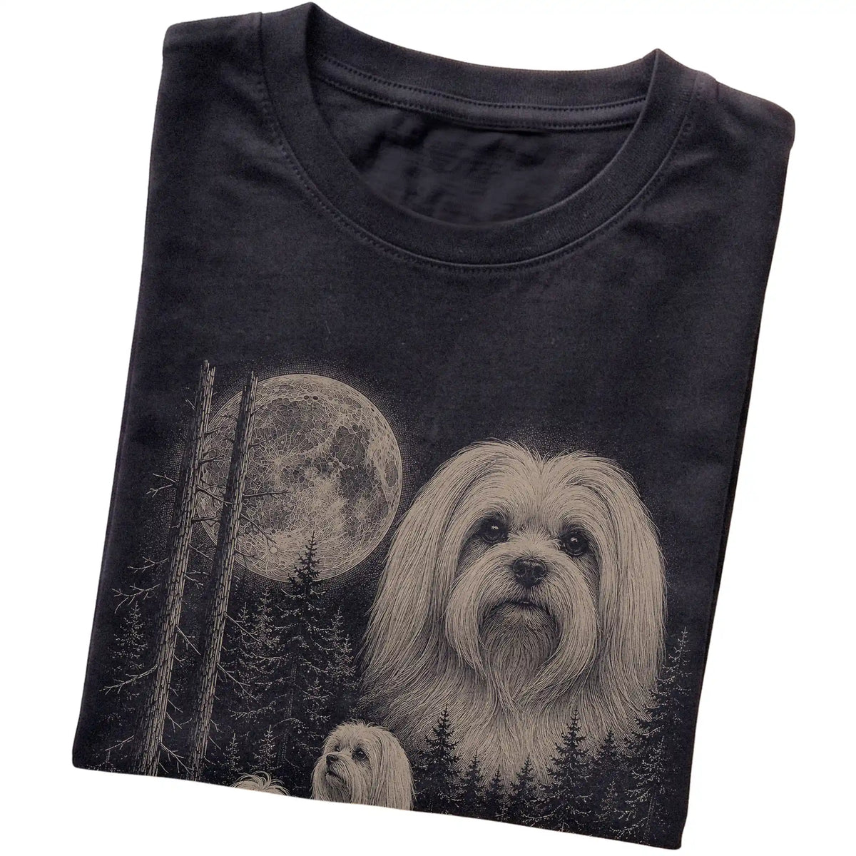 Folded black Softstyle T-shirt showing the Maltese Moonlit Forest graphic