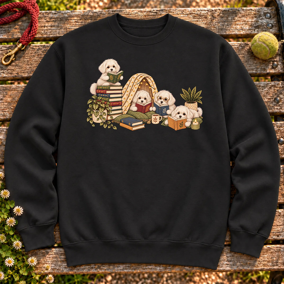 Maltese puppies reading books in a cozy blanket fort on a Black sweatshirt