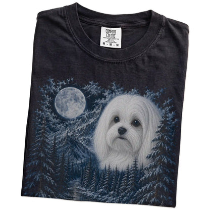 Folded black T-shirt with Maltese Winter Moon artwork.