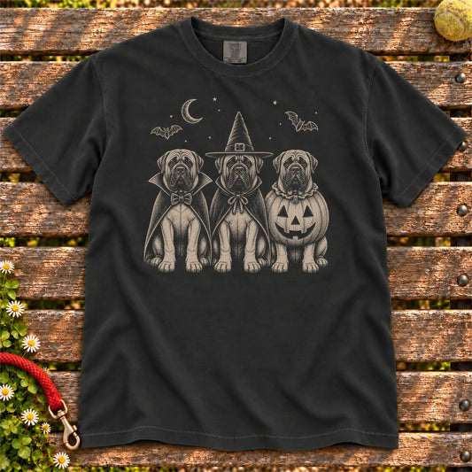 Three Mastiff dogs dressed for Halloween beneath bats and a crescent moon on a Black Comfort Colors® T-shirt