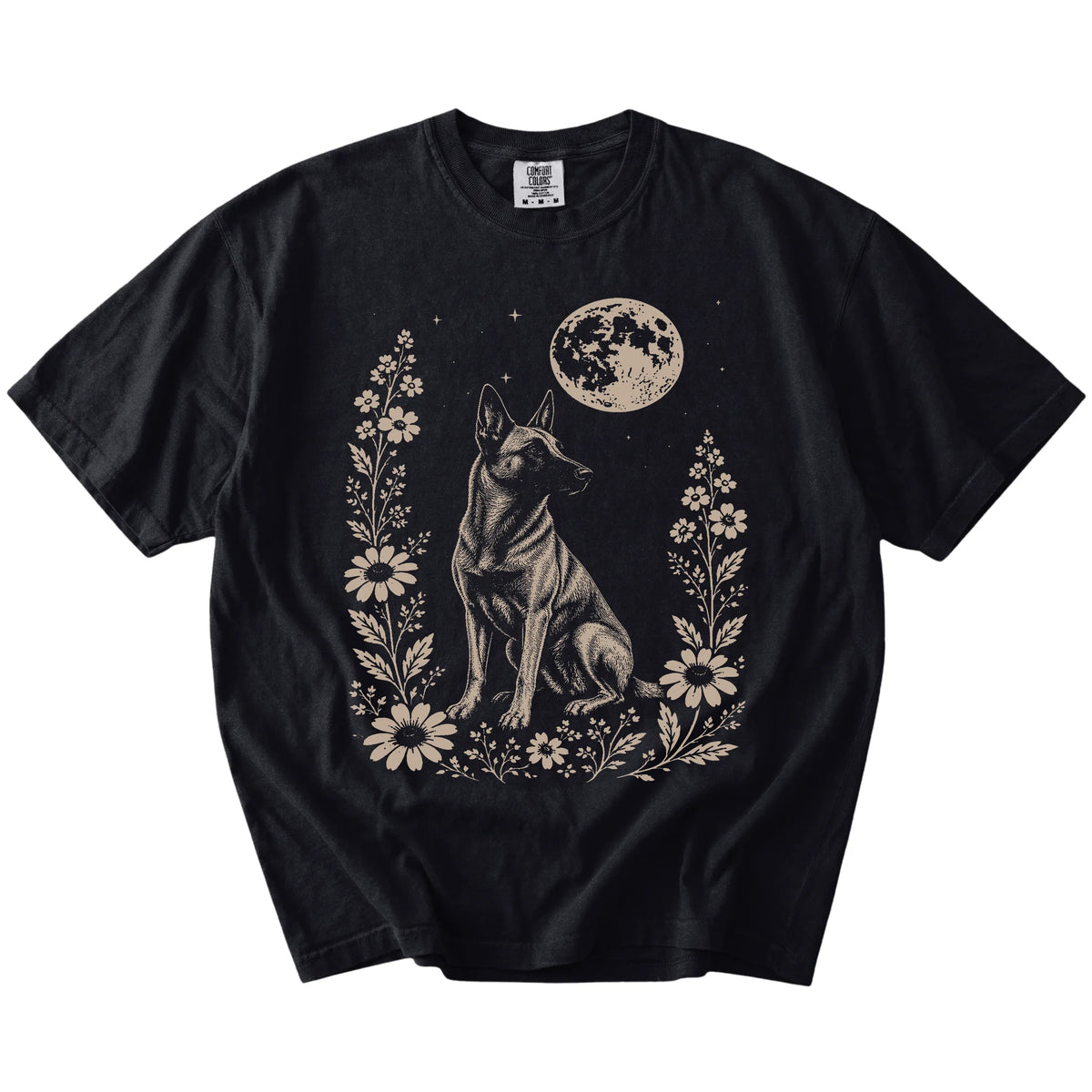 Belgian Malinois framed by flowers beneath the moon on a Black Comfort Colors® T-shirt