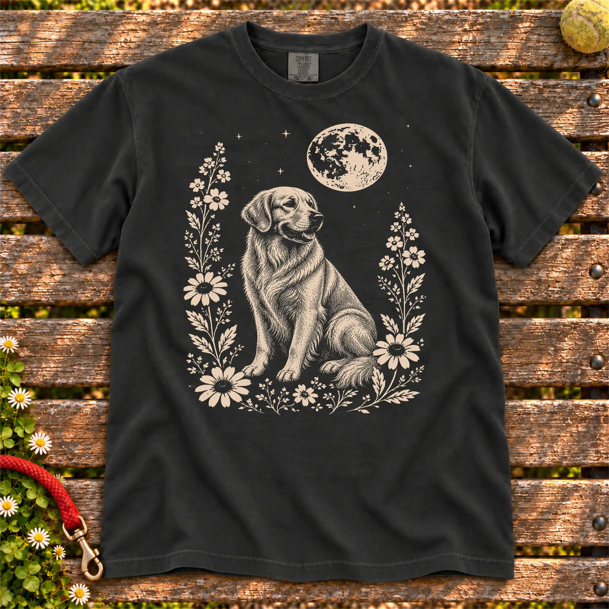 Moon Flowers Golden Retriever design on a Black Comfort Colors T-shirt, shown flat