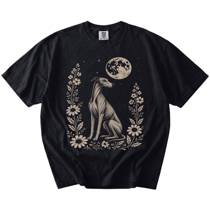 Greyhound framed by flowers beneath the moon on a Black Comfort Colors® T-shirt