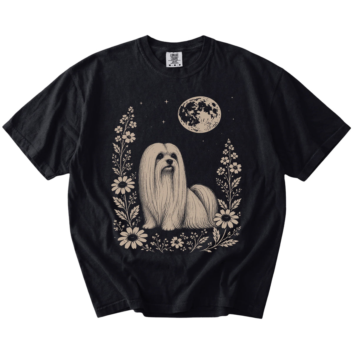 Maltese framed by flowers beneath the moon on a Black Comfort Colors® T-shirt