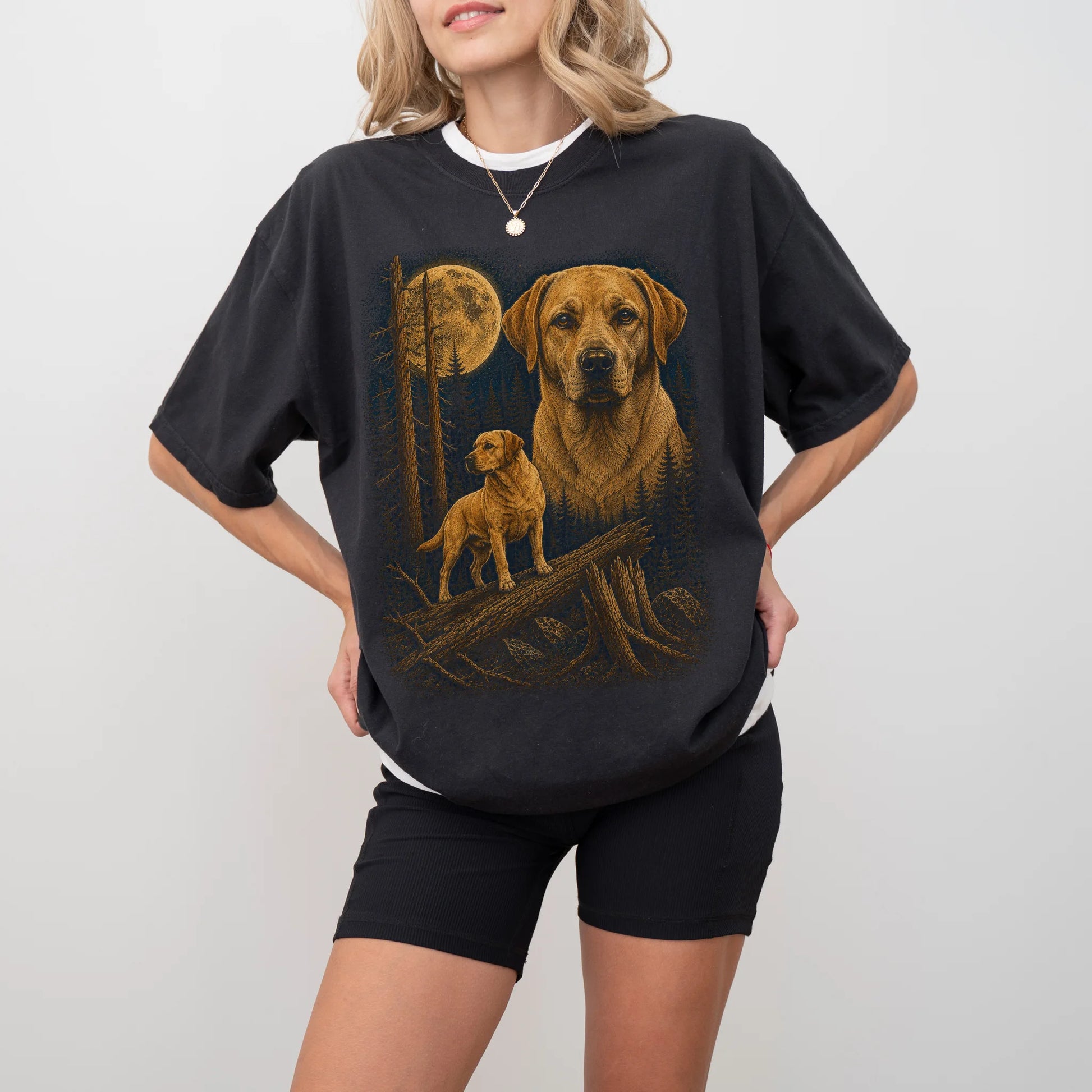 Person wearing a Black Labrador Retriever full-color Moonlit Forest t-shirt