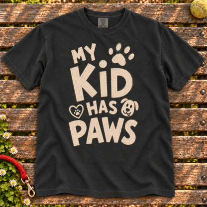 My Kid Has Paws design on a Black Comfort Colors T-shirt, shown flat