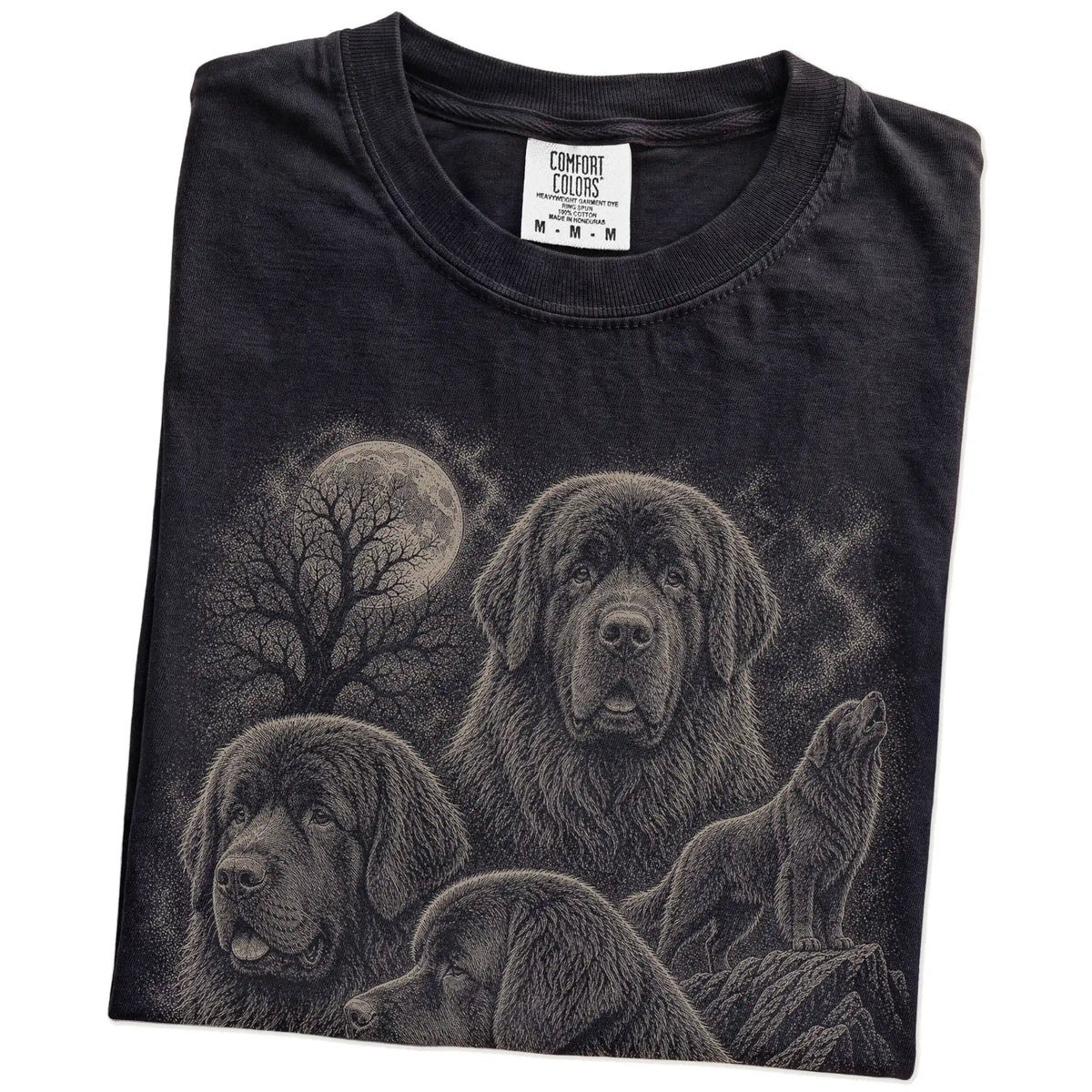 Folded Black Comfort Colors® T-shirt showing a vintage moon montage featuring Newfie