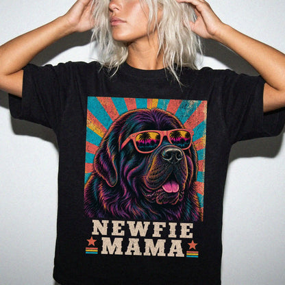 Retro Newfie Mama design on a Black Comfort Colors T-shirt worn by a model