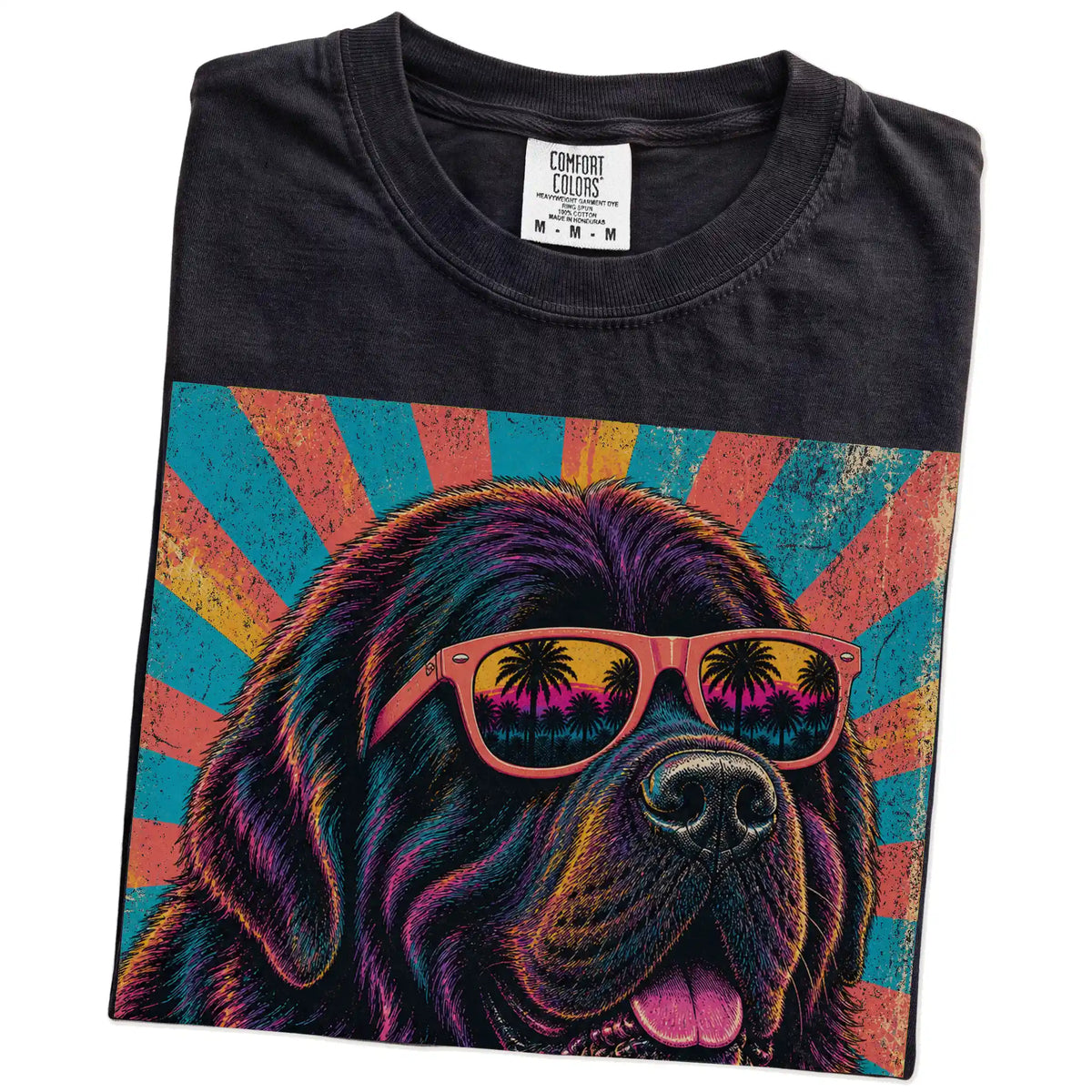 Retro Newfie Mama design on a Black Comfort Colors T-shirt folded detail