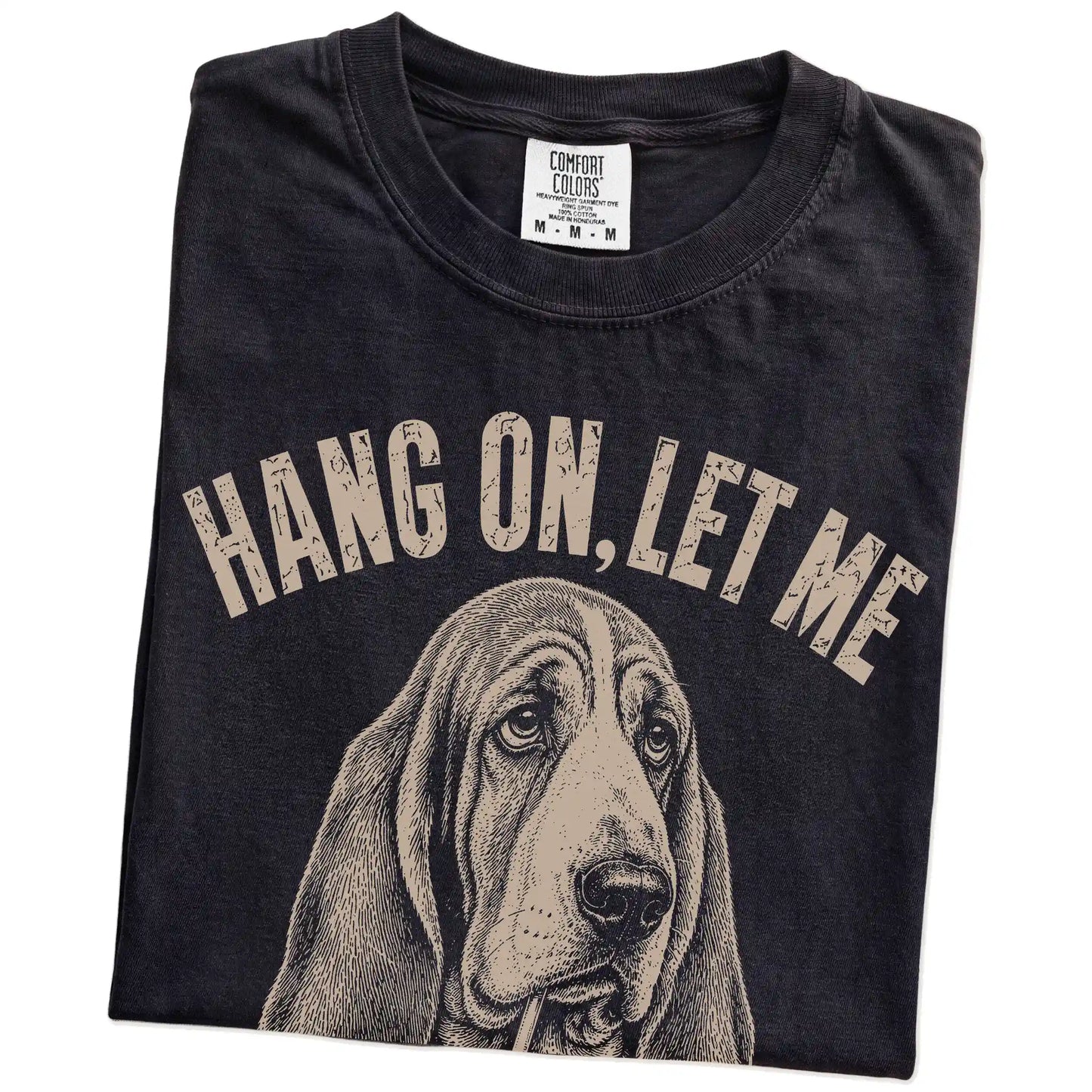 Folded Black Overthinking Basset Hound T-Shirt showing the graphic