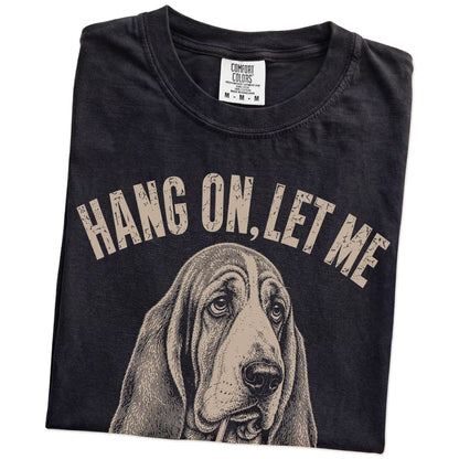 Folded Black Overthinking Basset Hound T-Shirt showing the graphic