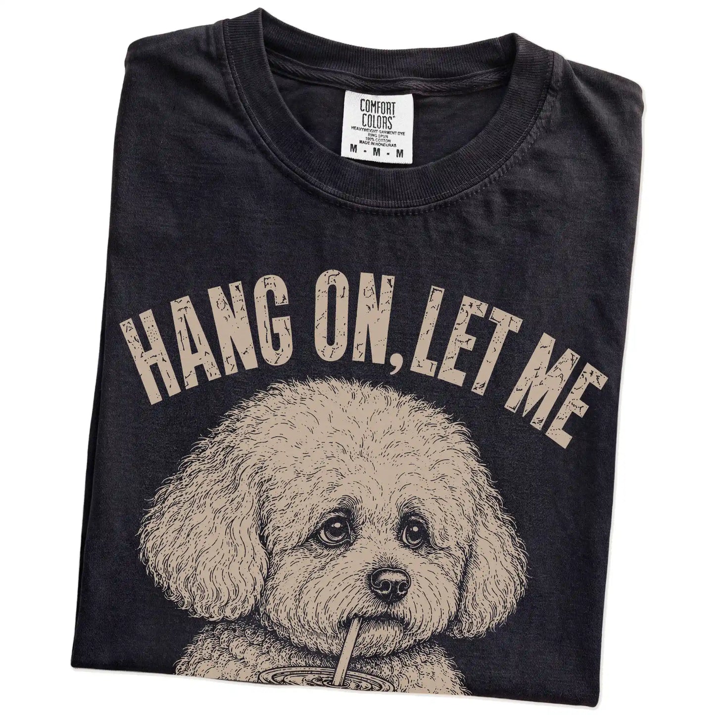 Folded Black Overthinking Bichon Frise T-Shirt showing the graphic