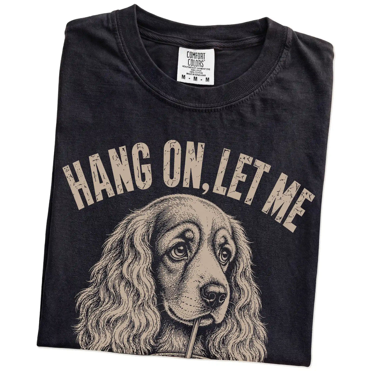Folded Black Overthinking Cocker Spaniel T-Shirt showing the graphic