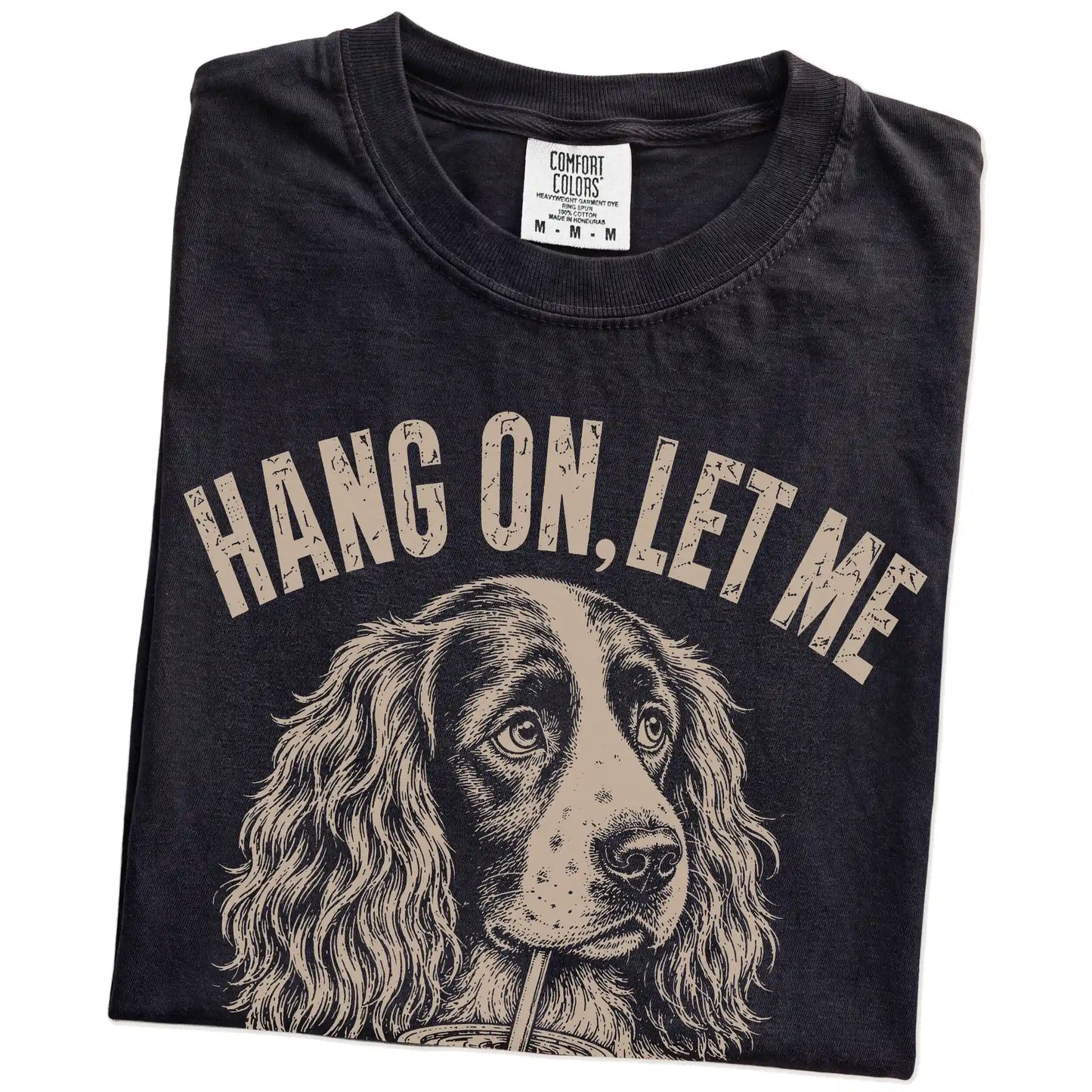 Folded Black Overthinking Springer Spaniel T-Shirt showing the graphic