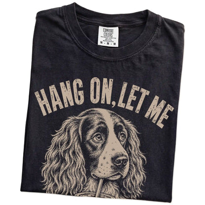 Folded Black Overthinking Springer Spaniel T-Shirt showing the graphic