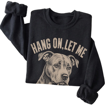 Black crewneck sweatshirt featuring Overthinking Pitbull, folded presentation