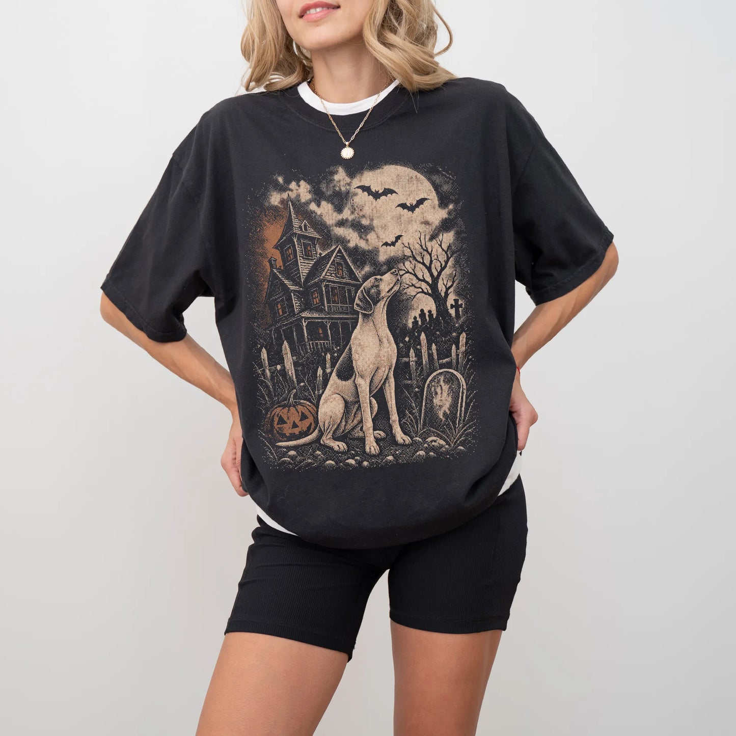 Model wearing a Black Comfort Colors® T-shirt showing Pointer in a vintage haunted-house scene