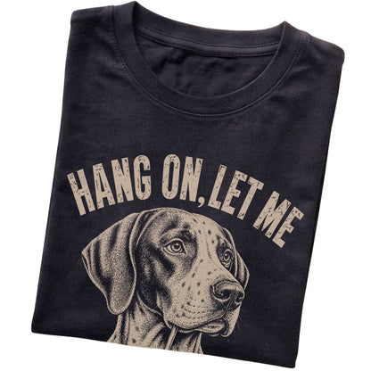 Black T-shirt featuring Overthinking Pointer, folded presentation