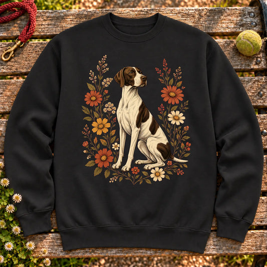 Pointer surrounded by wildflowers on a Black crewneck sweatshirt