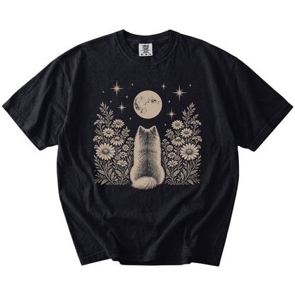Pomeranian beneath a wildflower moon on a Black Comfort Colors® T-shirt
